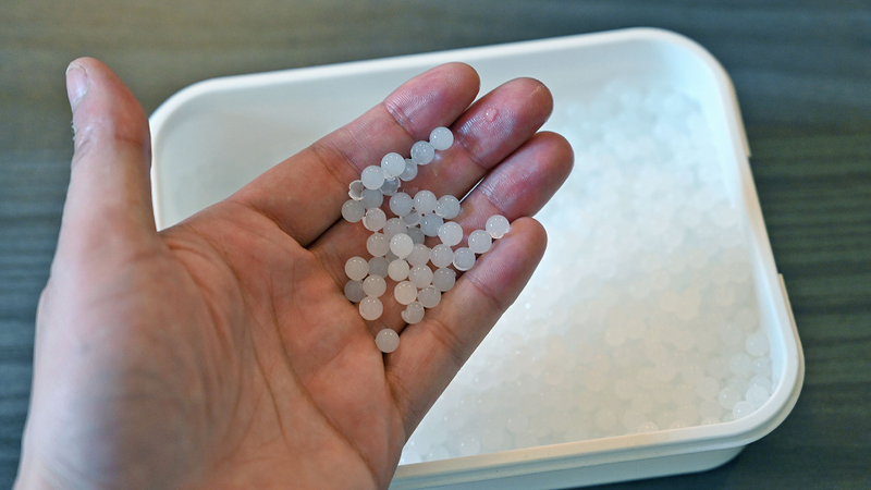 These are the gel beads the S1 uses as ammo. They start as tiny beads and need to be soaked in water so that they can expand to their full size before use.